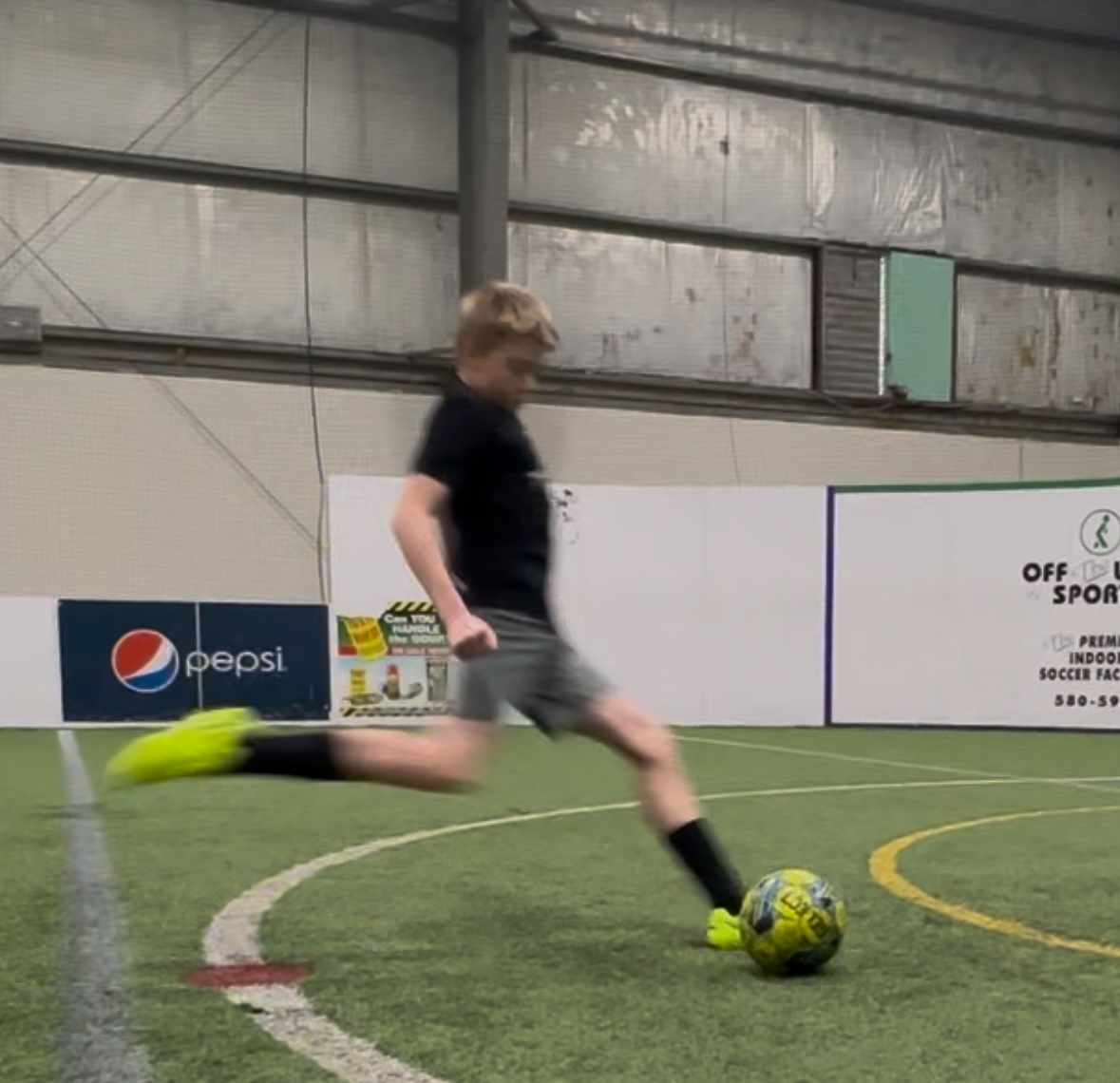 Player making pass under pressure
