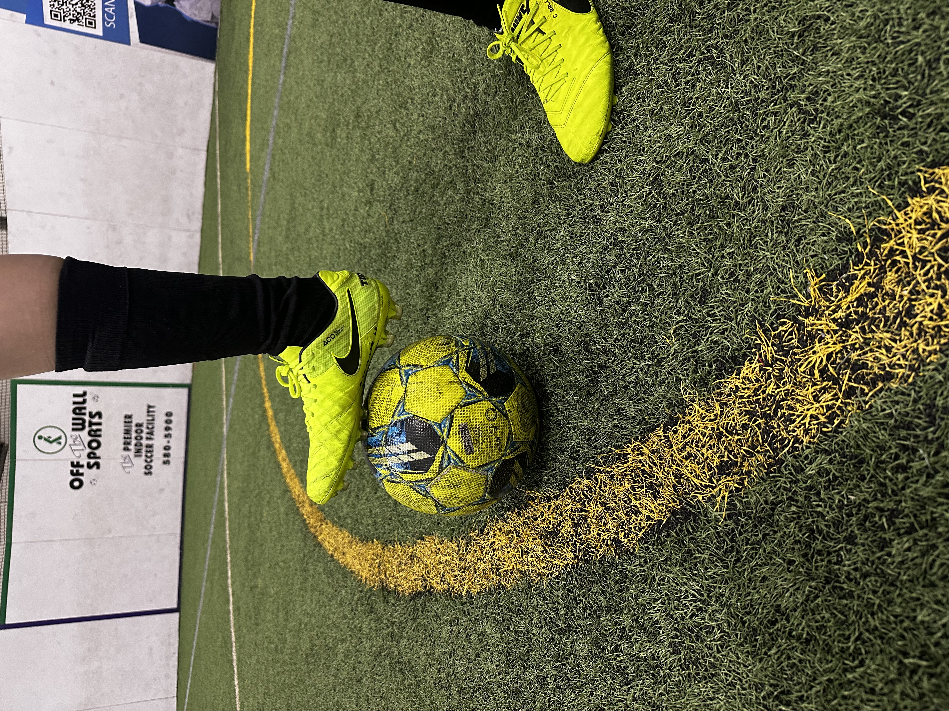 Player receiving ball under pressure